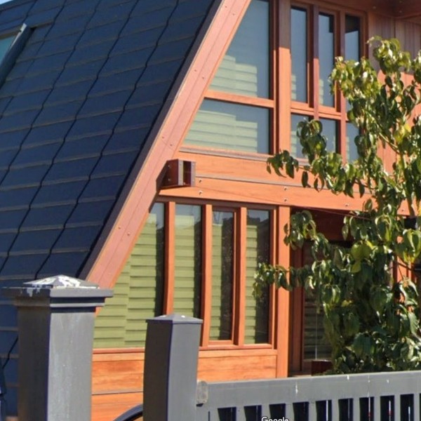 Impianto geotermico per villa in bioedilizia con struttura in vetro e legno